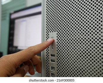 Finger Pushing On Start Button Office Computer PC.