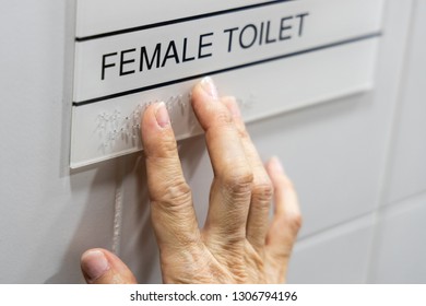 Finger Reading Braille Tactile On Toilet Signage In Hong Kong