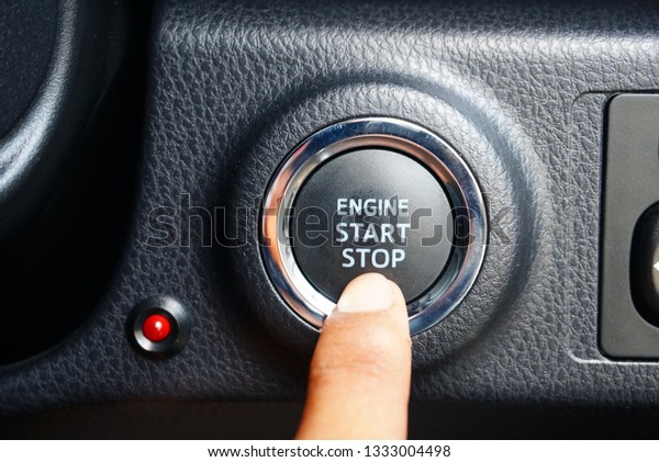  finger touch\
engine start button - Image
