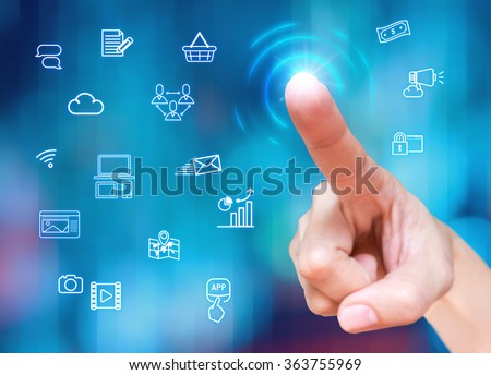 Finger touch on screen with Digital marketing feature icon at blur blue background,technology concept