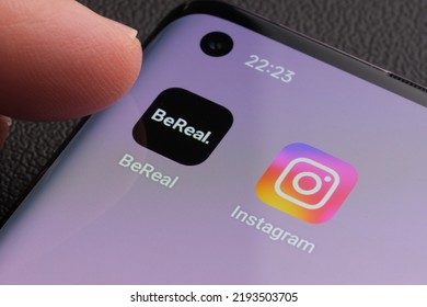 Finger Touching Bereal App Which Is The Next To Instagram App. BeReal Is A New Social Media App And Photo Sharing Platform. Stafford, United Kingdom, August 23, 2022.