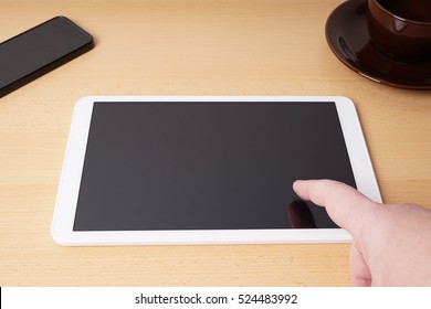 Finger Touching Blank Touchscreen Of Tablet Computer From Personal Perspective Or Point Of View