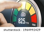 Finger touching digital screen of a CO2 monitor to measure indoor air quality and carbon dioxide concentration. Composite image between a hand photography and a 3D background.