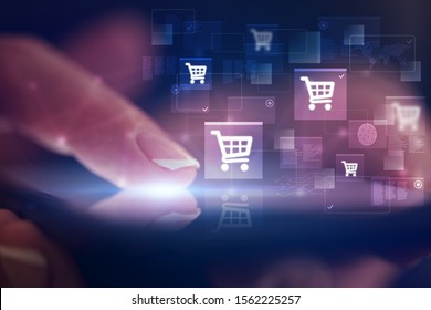 Finger Touching Phone With Online Shopping Concept And Dark Background