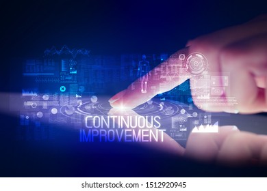 Finger touching tablet with web technology icons and CONTINUOUS IMPROVEMENT inscription
