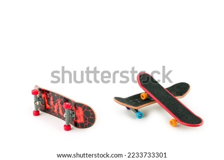  Fingerboard  a skateboard on white background