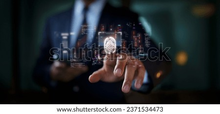 Fingerprint identification technology concept login on your smartphone to secure privacy of personal information. Male businessman uses hand to scan fingerprint with abstract code on background.