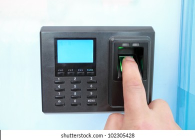 fingerprint and password lock in a office building - Powered by Shutterstock