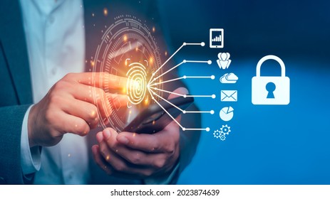 Fingerprint scan provides security access with biometric identification. Businessman using fingerprint indentification to access personal financial data. Technology Safety and biometric security. - Shutterstock ID 2023874639