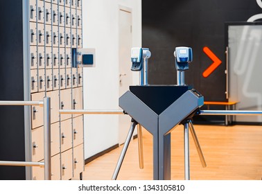 Fingerprint Scanners At The Entrance In Modern Bright Gym And Lockers.