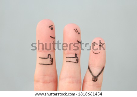 Fingers art of happy family. Concept parents are proud of their child.