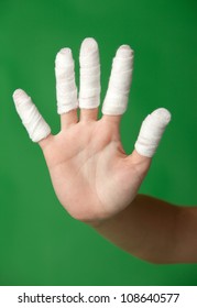 Fingers In Bandage.  On A Green Background