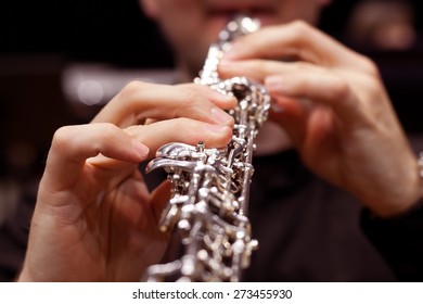 The Fingers Of The Person Playing The Oboe Closeup