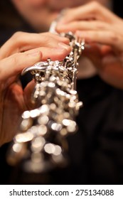 The Fingers Of The Person Playing The Oboe Closeup