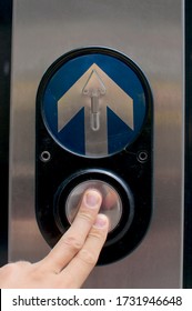 Fingers Pressing A Traffic Light Button In Brisbane. This Can Be Used As Concepts For Taking Decision, Moving Forward Or Moving Up To The Next Level