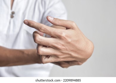 Fingers Rigidity, Hand Muscles Spasm, Or Weakness Of Digits. Closeup View.