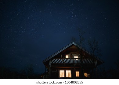 Finish cottage with clear night sky and stars
