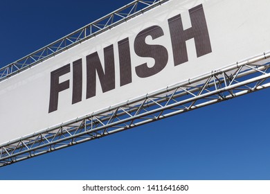 Finish Line Banner In A Metal Framework, Across A Clear Blue Sky