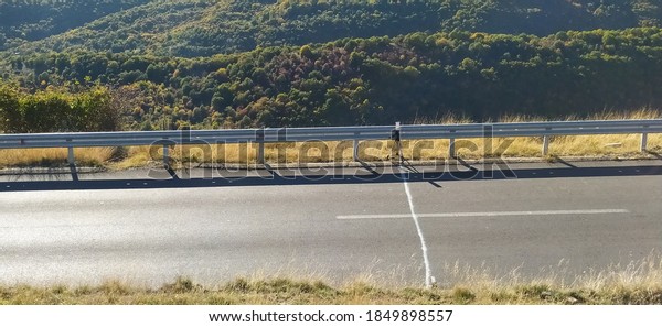 Finish line of a\
hill climb championship race at the finish line on a lovely sunny\
autumn day in the\
mountains