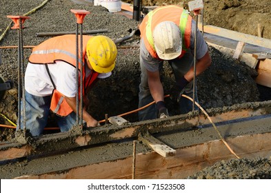 Finish Work As Workers Are Pouring A Foundation For A New Commercial Building In Roseburg Oregon