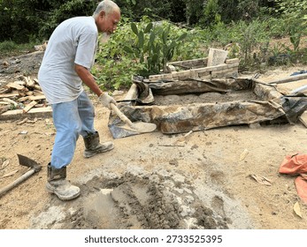 A finished cement base marks completion stage of a DIY backyard duck pond construction project.