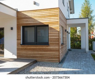 Finished house with fast construction, wooden cladding, economical environmentally friendly technology. Modern, elegant, minimalist style passive house with recycled materials. Tiny house with a youth
