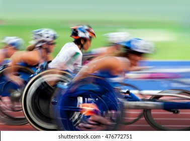 finishing spurt  wheelchair in motion at the stadium