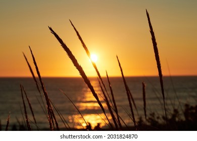 Finisterre Sunset in Galicia, Spain. Mar de Fora beach and Nave cape in Costa da Morte. 