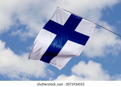 Finland flag isolated on sky background. close up waving flag of Finland. flag symbols of Finnish.