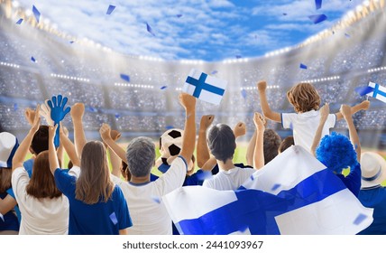 Finland football supporter on stadium. Finnish fans on soccer pitch watching team play. Group of supporters with flag and national jersey cheering for Suomi. Championship game. - Powered by Shutterstock