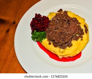 A Finland Main Course Of Sauteed Reindeer With Cranberries And Mashed Potatoes