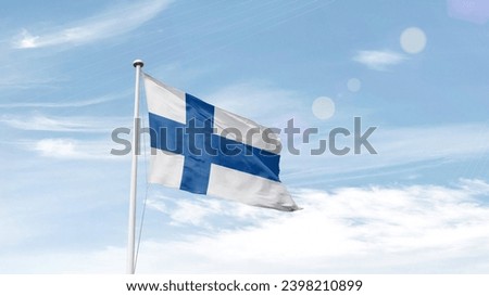 Finland national flag waving in the sky.