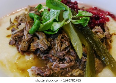 Finnish / Sápmi Style Reindeer Stew Served With Pickled, Lamb's Lettuce And Lingonberry