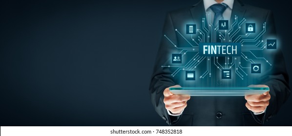 Fintech (financial technology) concept. Business person with tablet and fintech illustration. - Shutterstock ID 748352818