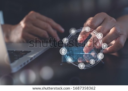 Fintech financial technology, internet payment, money exchange, digital banking concept. Man use mobile smart phone and laptop computer, world currency, wallet cryptocurrency on virtual screen