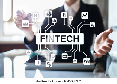 Fintech. Financial technology text on virtual screen. Business, internet and technology concept.  - Shutterstock ID 1045088371