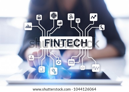 Fintech. Financial technology text on virtual screen. Business, internet and technology concept. 