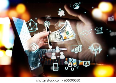Fintech Investment Financial Technology Concept. P2P Payment concept image.Startup and crowd funding concept.Social network with P2P lending. Smart phone with technology icons coming out from screen.