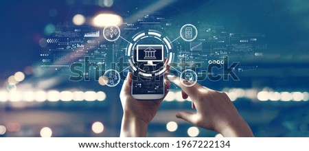 Fintech theme with person using a smartphone