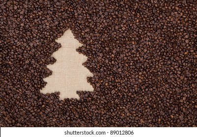 Fir tree made of roasted coffee beans on burlap - Powered by Shutterstock