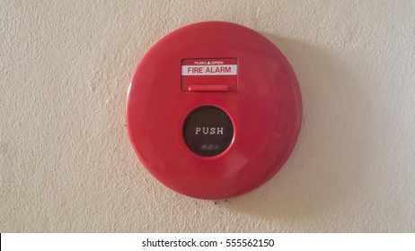 Fire Alarm Bell On White Wall Backgrounf