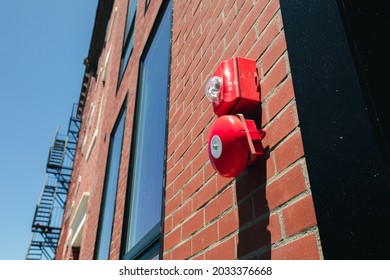 A fire alarm with built in strobe light to alert in case of fire in Boston.