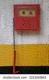 Fire Alarm Device On The Wall.

