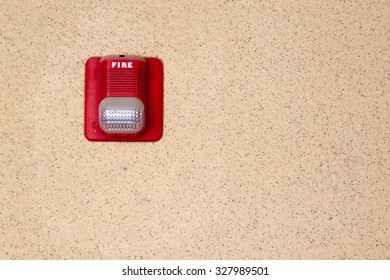 Fire Alarm Light On Noisy Wall