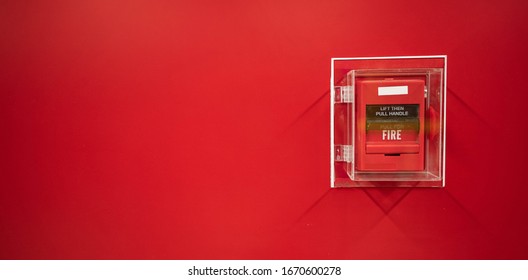 Fire alarm on the wall in subway in Bangkok,  At the Bangkok subway fire warning equipment for emergency. It’s red fire alarm switch  on the wall. Founded un everywhere for the public area.  - Powered by Shutterstock