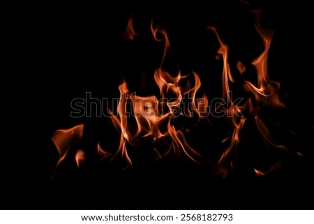 Fire background. Abstract dark background. Fire flame background. Abstract fire flame background. Large burning fire.