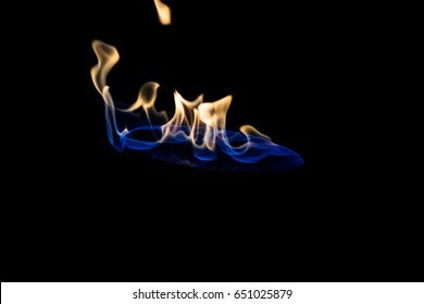 Fire With Blue Flame Base And Orange Flames Towards Top With Circular Shaped Base