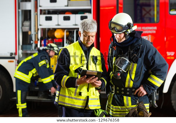 fire-brigade-squad-leader-gives-instructions-stock-photo-edit-now