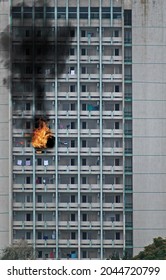 A Fire Broke Out On The Floor Of A Tall Building. Building On Fire.