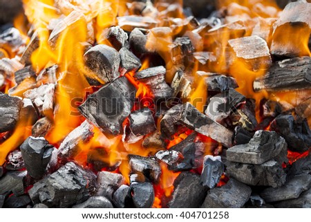 The fire, burning coals close up